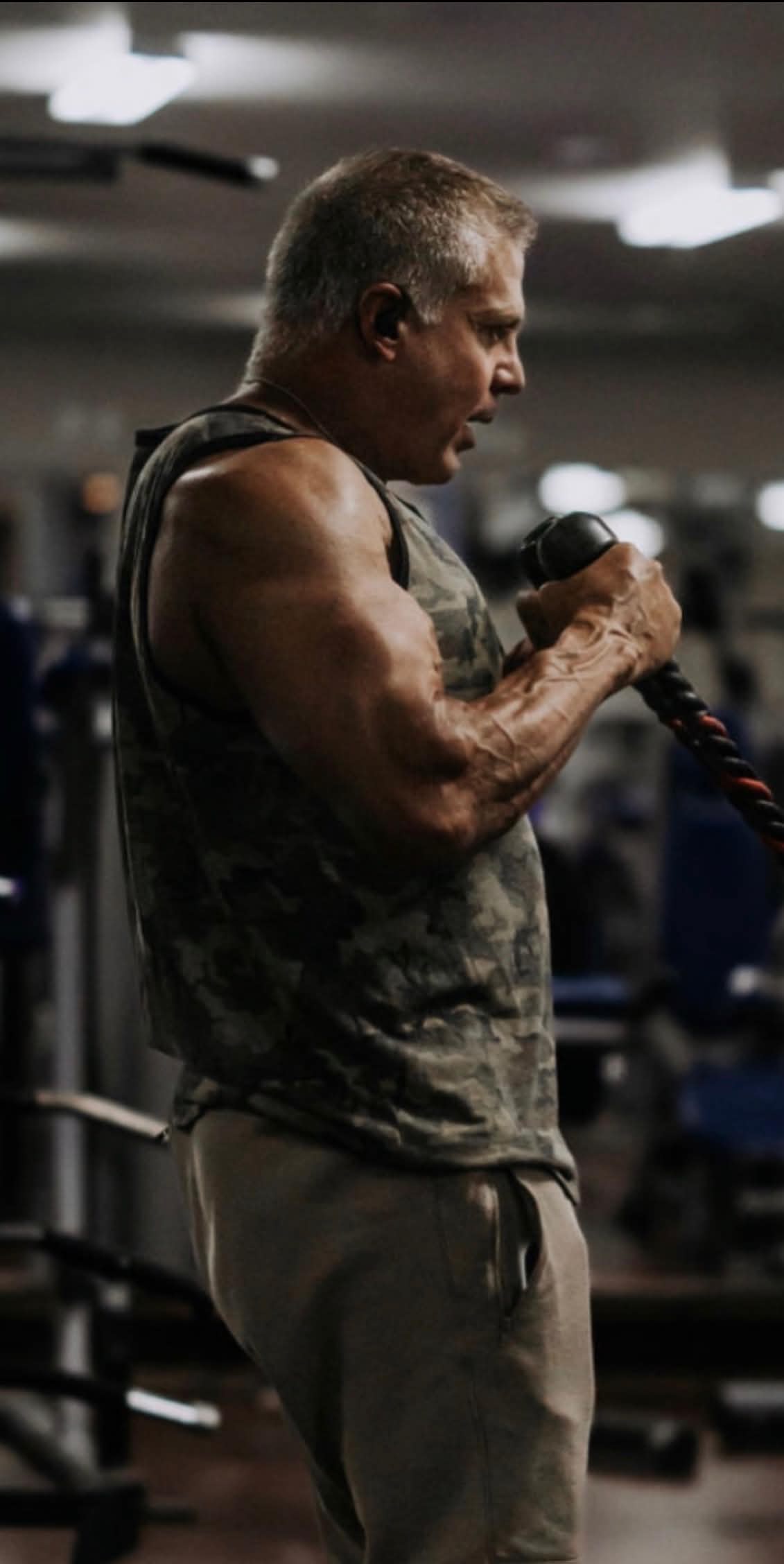 Dr. Cabrera displaying full physique transformation